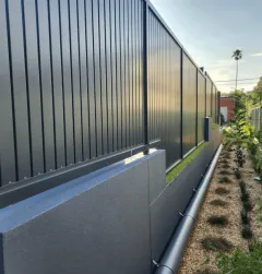 Grey aluminium slat side fencing