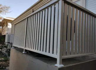 Timber-look aluminium privacy screen and deck