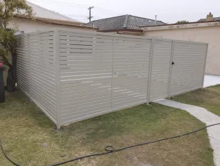 Grey aluminium front fence and pedestrian gate